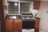 Kitchenette with full size cooking stove,